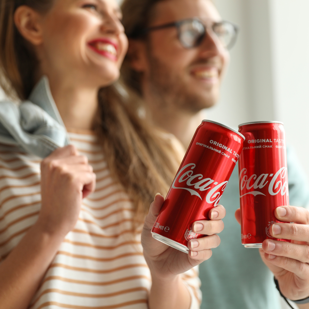 Video ads for Coca-Cola featuring a refreshing and iconic beverage being enjoyed in various lively and diverse settings. The Coca-Cola logo is prominently displayed, conveying a sense of joy and positivity associated with the brand.